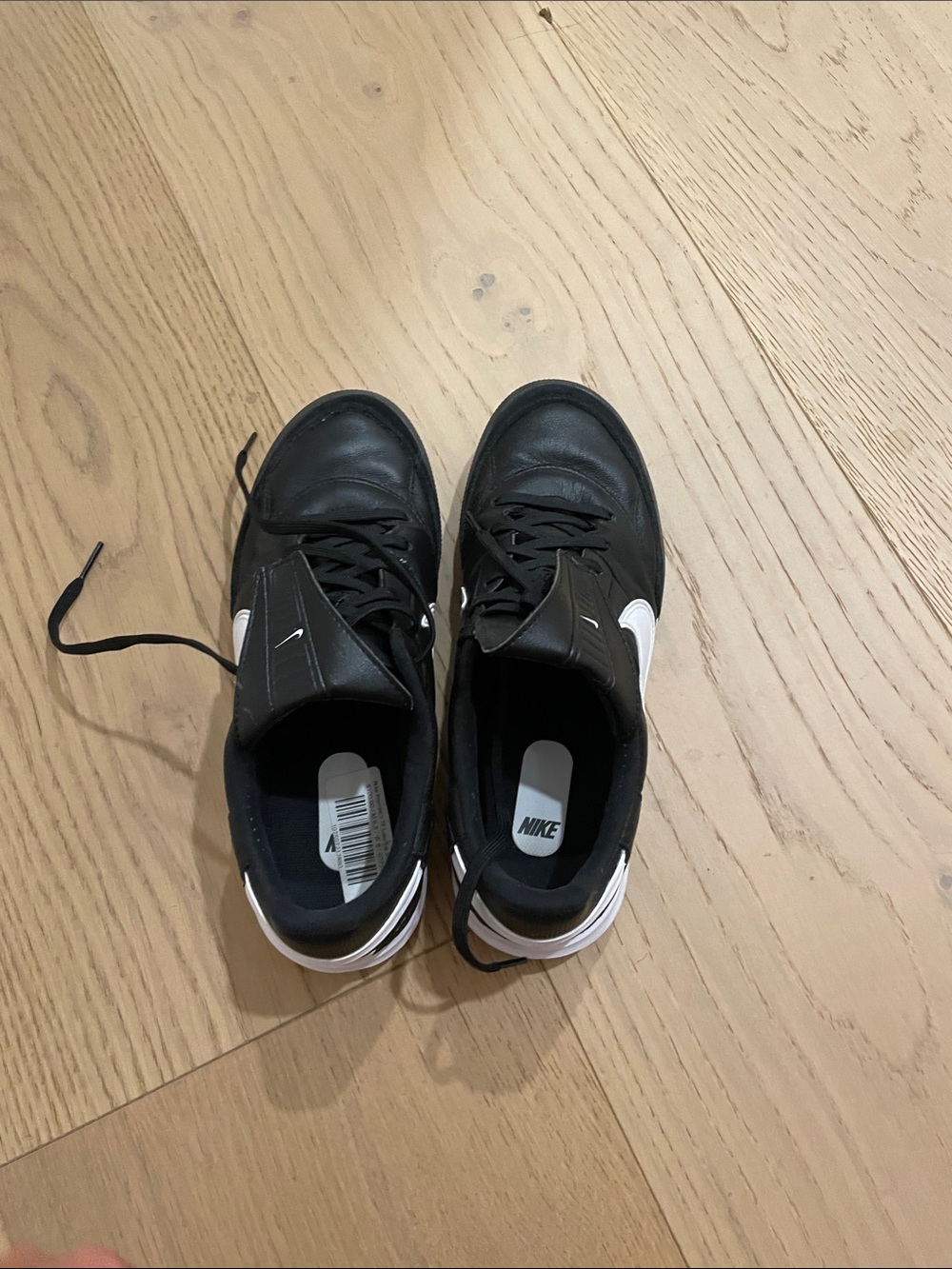 Nike Black and White Men’s or Women’s turf shoes